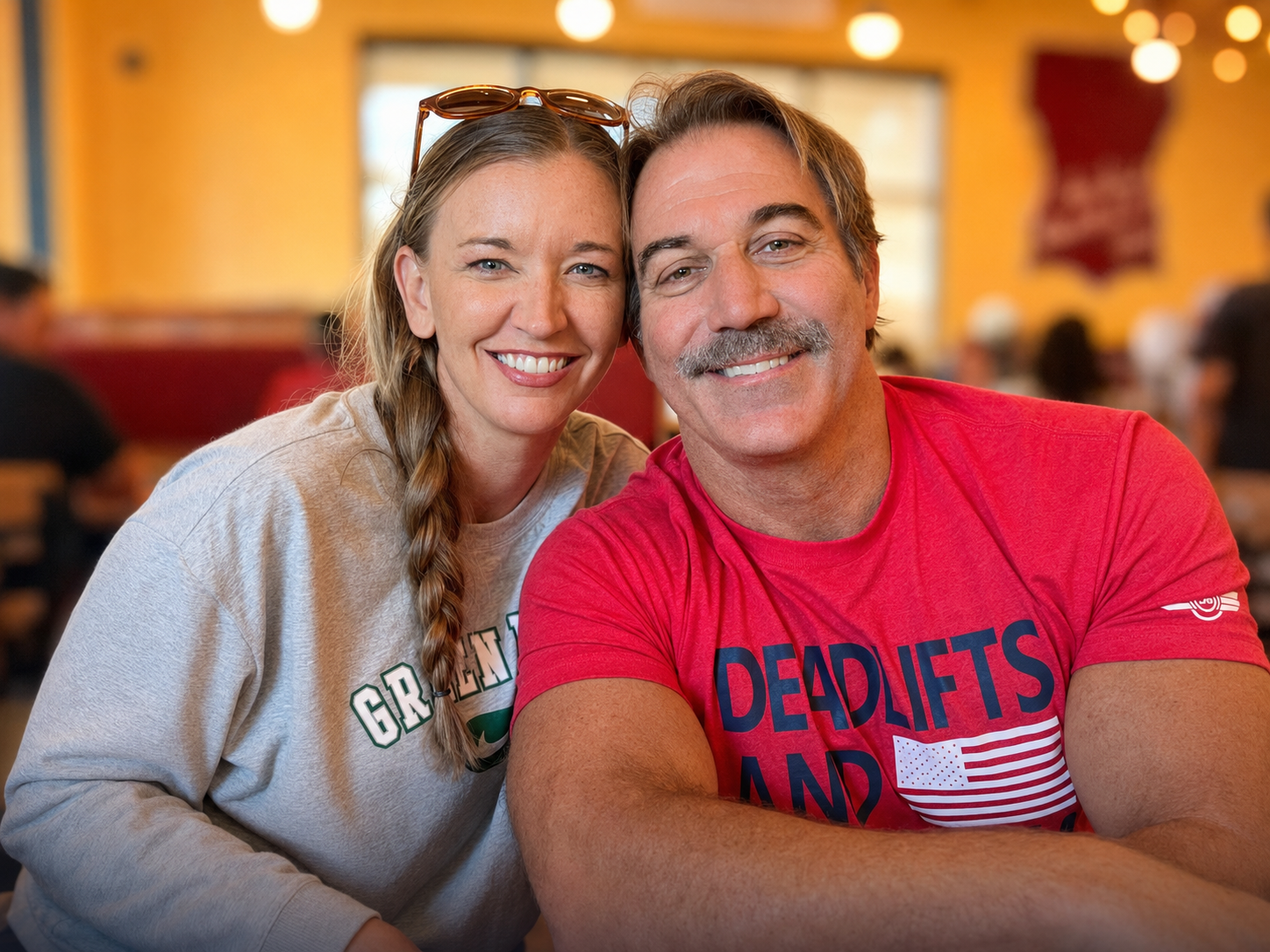 Melissa and Andy, the fire family behind CMD + SHIFT, smiling together